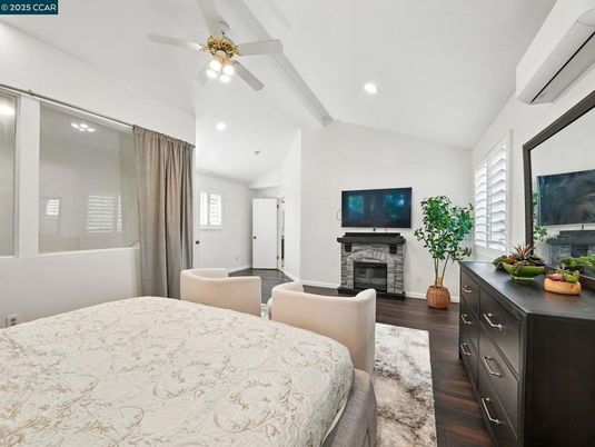 Bedroom, Fireplace, Interior, Recessed Lighting, Wood Texture Flooring