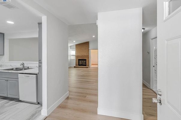 Fireplace, Interior, Kitchen, Recessed Lighting, Wood Texture Flooring
