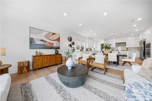 Dining room, Interior, Kitchen, Living room, Pendant Lights, Recessed Lighting, Stainless Steel Appliances, Wood Texture Flooring