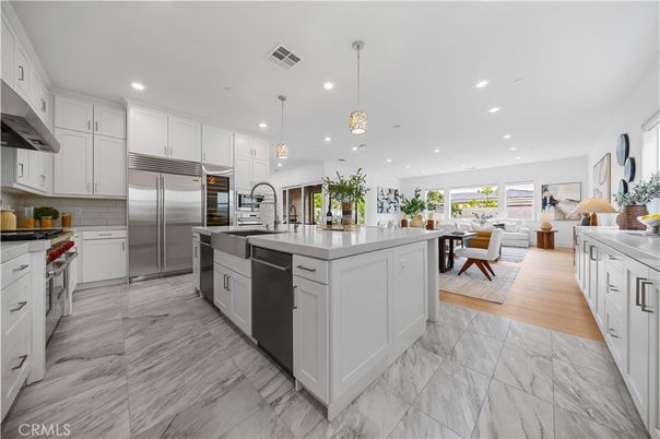 Dining room, Interior, Kitchen, Living room, Marble, Pendant Lights, Recessed Lighting, Stainless Steel Appliances, Wood Texture Flooring