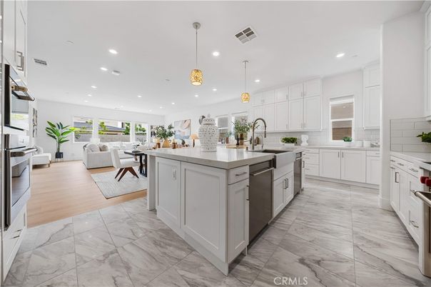 Interior, Kitchen, Living room, Marble, Pendant Lights, Recessed Lighting, Stainless Steel Appliances, Wood Texture Flooring