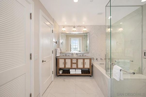 Bathroom, Dual Sink Vanities, Glass Shower, Interior, Marble, Marble Walls, Recessed Lighting