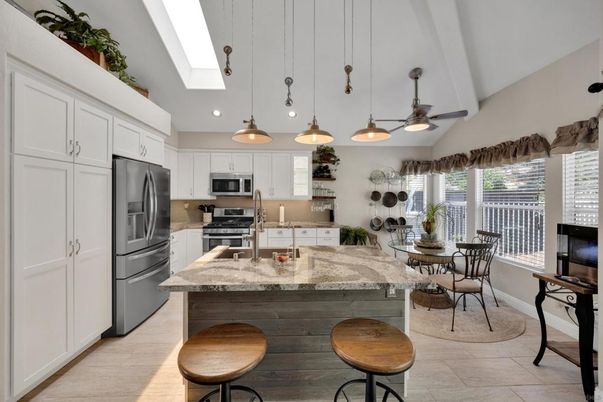 Dining room, Interior, Kitchen, Pendant Lights, Recessed Lighting, Stainless Steel Appliances, Wood Texture Flooring