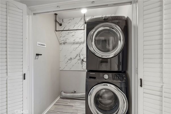 Interior, Marble Walls, Utility Closets, Washer, Wood Texture Flooring