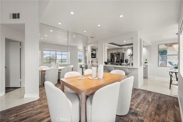Dining room, Interior, Kitchen, Recessed Lighting, Stainless Steel Appliances, Wood Texture Flooring