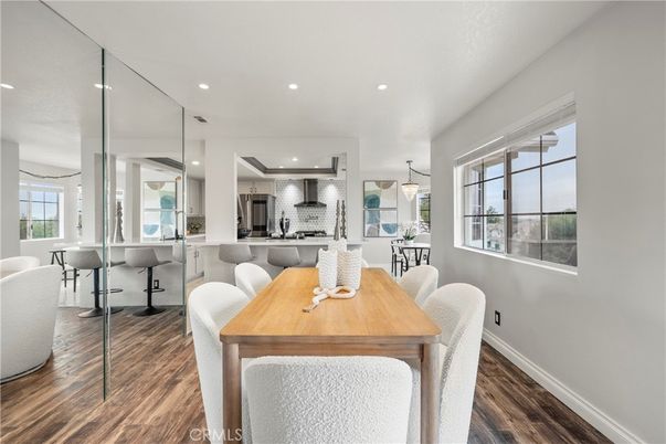 Dining room, Interior, Kitchen, Pendant Lights, Recessed Lighting, Stainless Steel Appliances, Wood Texture Flooring