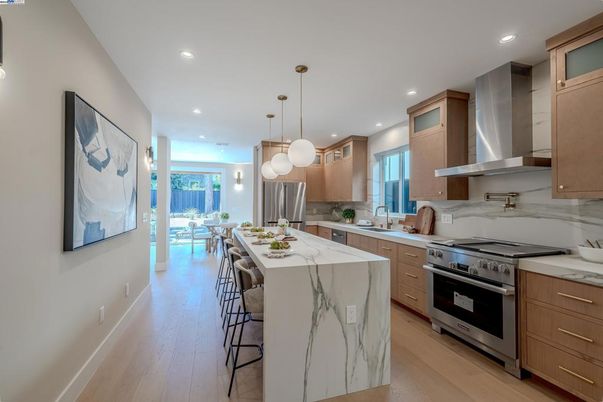 Dining room, Interior, Kitchen, Pendant Lights, Recessed Lighting, Stainless Steel Appliances, Wood Texture Flooring