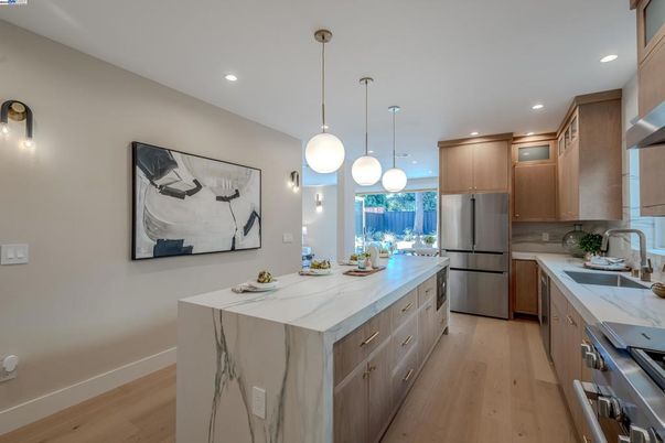 Interior, Kitchen, Pendant Lights, Recessed Lighting, Stainless Steel Appliances, Wood Texture Flooring