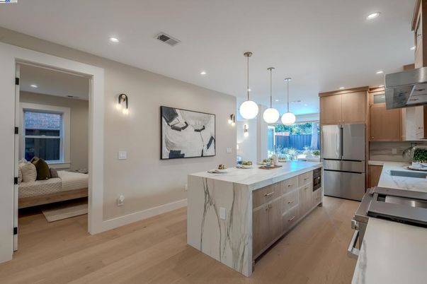 Interior, Kitchen, Pendant Lights, Recessed Lighting, Stainless Steel Appliances, Wood Texture Flooring
