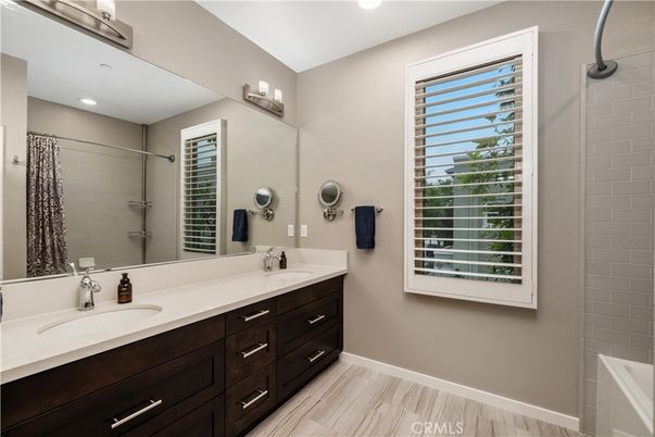 Bathroom, Dual Sink Vanities, Interior, Recessed Lighting, Wood Texture Flooring