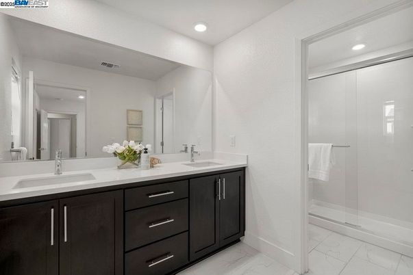 Bathroom, Dual Sink Vanities, Glass Shower, Interior, Marble, Recessed Lighting