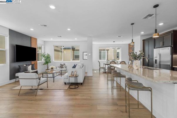 Dining room, Interior, Kitchen, Living room, Pendant Lights, Recessed Lighting, Stainless Steel Appliances, Wood Texture Flooring