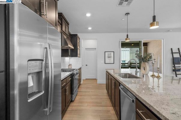 Interior, Kitchen, Pendant Lights, Recessed Lighting, Stainless Steel Appliances, Wood Texture Flooring