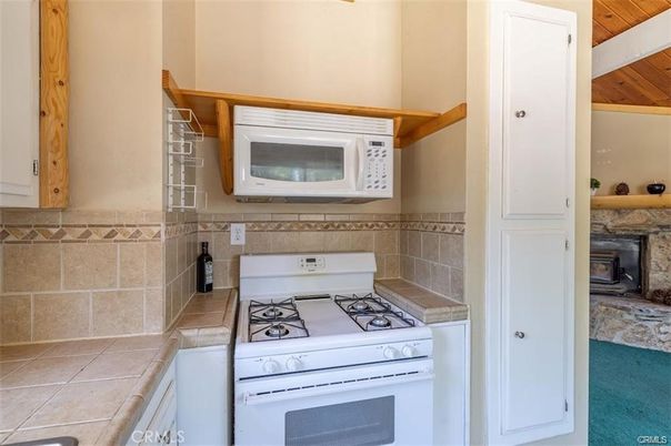 Fireplace, Interior, Kitchen, Tile Countertops