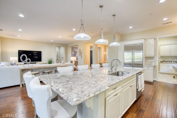 Dining room, Interior, Kitchen, Living room, Pendant Lights, Recessed Lighting, Stainless Steel Appliances, Wood Texture Flooring
