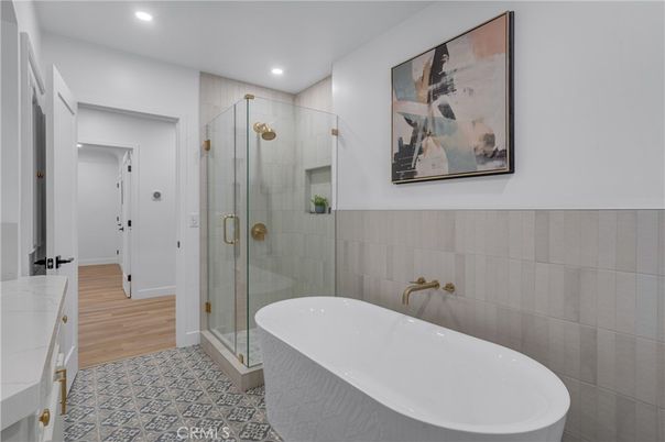 Bathroom, Free Standing Baths, Glass Shower, Interior, Recessed Lighting, Wood Texture Flooring