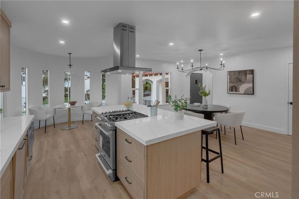 Dining room, Interior, Kitchen, Pendant Lights, Recessed Lighting, Stainless Steel Appliances, Wood Texture Flooring