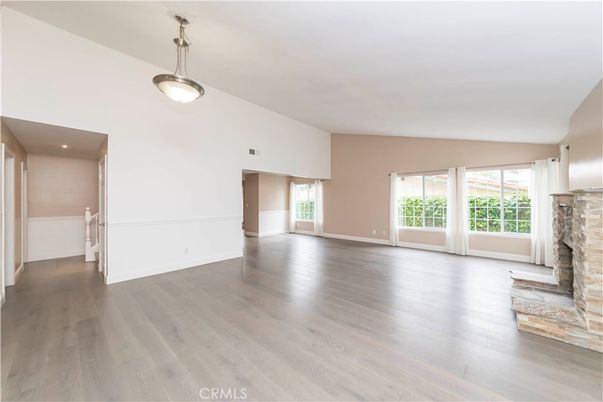Empty room, Fireplace, Interior, Pendant Lights, Recessed Lighting, Wood Texture Flooring