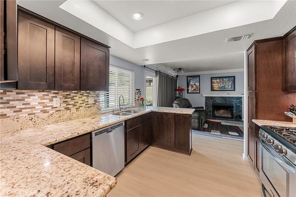 Fireplace, Interior, Kitchen, Recessed Lighting, Wood Texture Flooring