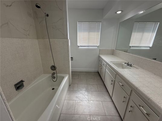 Bathroom, Dual Sink Vanities, Interior, Recessed Lighting, Tile Countertops
