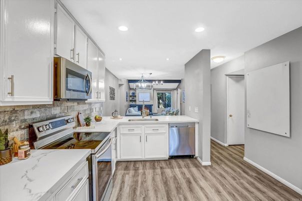 Interior, Kitchen, Pendant Lights, Recessed Lighting, Stainless Steel Appliances, Wood Texture Flooring
