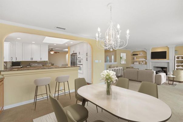 Chandelier, Dining room, Fireplace, Interior, Kitchen, Living room, Recessed Lighting, Stainless Steel Appliances