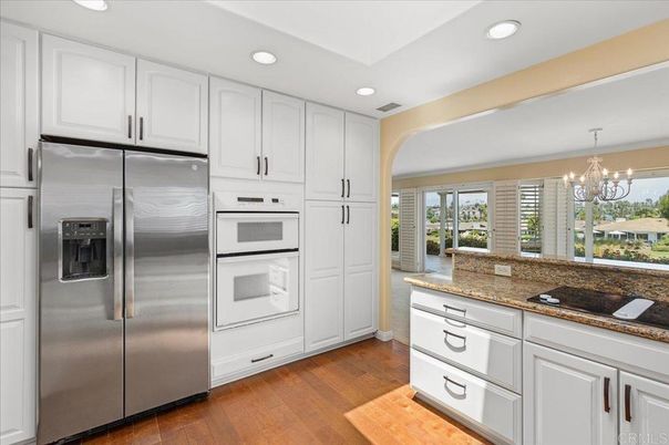 Chandelier, Interior, Kitchen, Recessed Lighting, Stainless Steel Appliances, Wood Texture Flooring