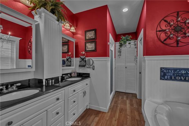 Bathroom, Dual Sink Vanities, Interior, Recessed Lighting, Wood Texture Flooring
