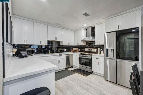 Interior, Kitchen, Recessed Lighting, Stainless Steel Appliances, Wood Texture Flooring