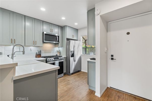 Interior, Kitchen, Recessed Lighting, Stainless Steel Appliances, Wood Texture Flooring