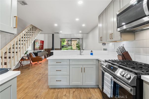 Interior, Kitchen, Recessed Lighting, Stainless Steel Appliances, Wood Texture Flooring