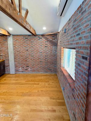 Empty room, Interior, Recessed Lighting, Stone Walls, Wood Texture Flooring