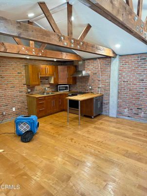 Interior, Kitchen, Recessed Lighting, Stainless Steel Appliances, Stone Walls, Wooden Beams, Wood Texture Flooring