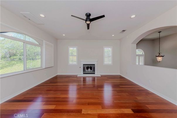 Empty room, Fireplace, Interior, Pendant Lights, Recessed Lighting, Wood Texture Flooring