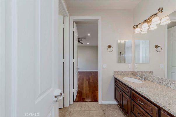 Bathroom, Dual Sink Vanities, Interior, Recessed Lighting, Wood Texture Flooring