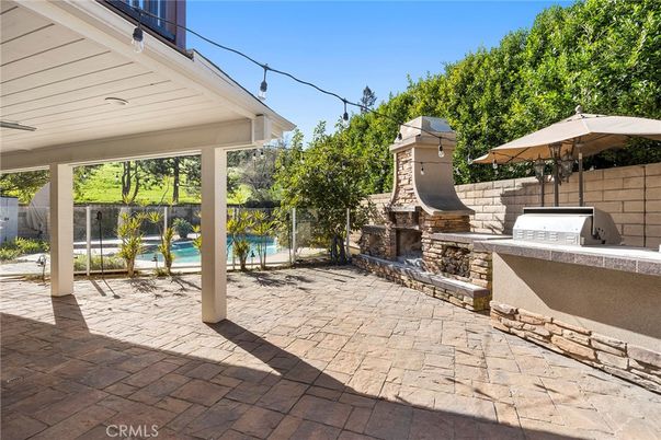 Exterior, Fireplace, Pool