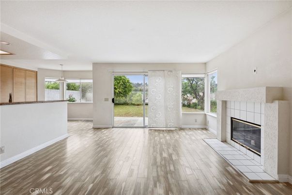 Empty room, Fireplace, Interior, Pendant Lights, Wood Texture Flooring