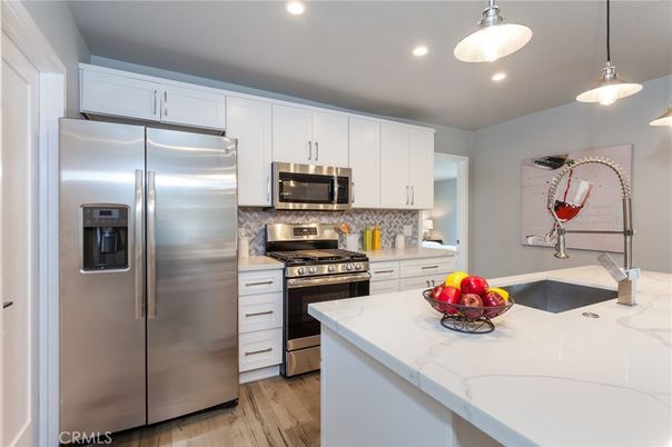 Interior, Kitchen, Pendant Lights, Recessed Lighting, Stainless Steel Appliances, Wood Texture Flooring
