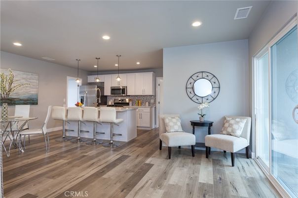 Dining room, Interior, Kitchen, Pendant Lights, Recessed Lighting, Stainless Steel Appliances, Wood Texture Flooring