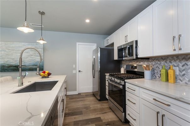 Interior, Kitchen, Pendant Lights, Recessed Lighting, Stainless Steel Appliances, Wood Texture Flooring