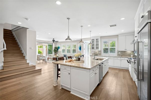 Dining room, Interior, Kitchen, Pendant Lights, Recessed Lighting, Stainless Steel Appliances, Wood Texture Flooring