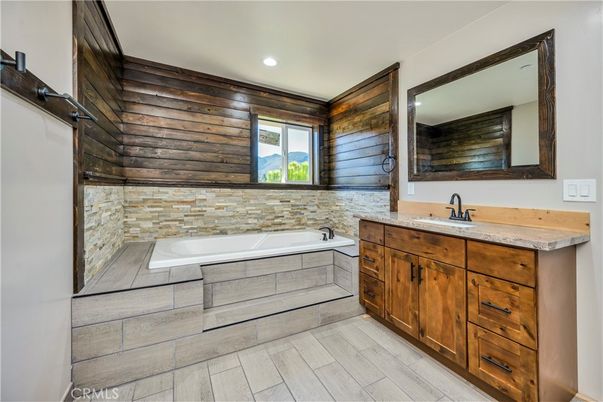 Bathroom, Dual Sink Vanities, Interior, Recessed Lighting, Wood Texture Flooring, Wooden Walls