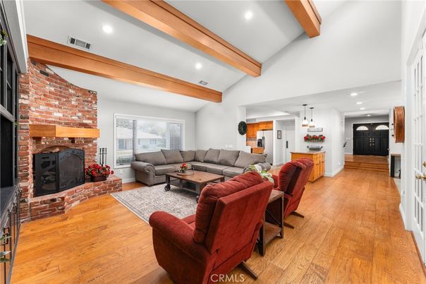 Fireplace, Interior, Living room, Pendant Lights, Recessed Lighting, Stone Walls, Wooden Beams, Wood Texture Flooring