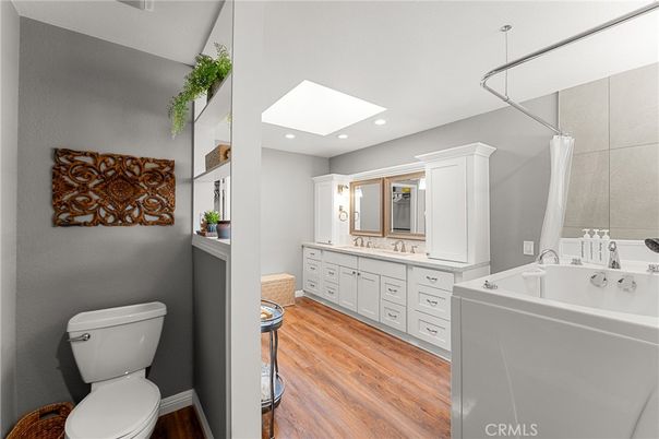 Bathroom, Dual Sink Vanities, Interior, Recessed Lighting, Wood Texture Flooring
