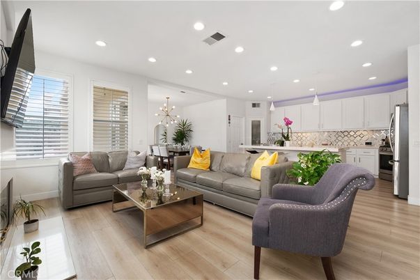 Dining room, Interior, Kitchen, Living room, Pendant Lights, Recessed Lighting, Stainless Steel Appliances, Wood Texture Flooring