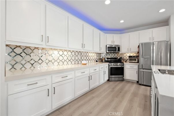 Interior, Kitchen, Recessed Lighting, Stainless Steel Appliances, Wood Texture Flooring