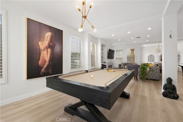 Billiard Table, Game Room, Interior, Living room, Pendant Lights, Recessed Lighting, Wood Texture Flooring