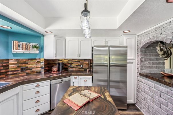Interior, Kitchen, Recessed Lighting, Stainless Steel Appliances, Stone Walls, Wood Texture Flooring