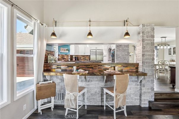 Interior, Kitchen, Pendant Lights, Stainless Steel Appliances, Stone Walls, Wood Texture Flooring