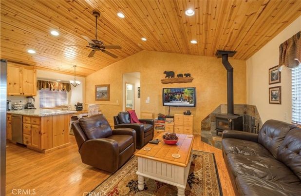 Chandelier, Fireplace, Interior, Kitchen, Living room, Recessed Lighting, Wooden Ceilings, Wood Texture Flooring